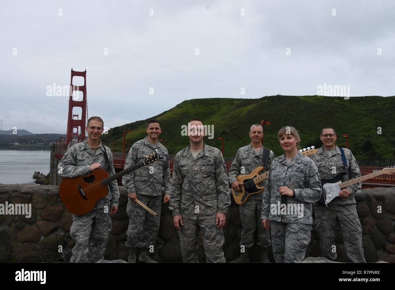 Mobility poses for a picture in front of the Golden Gate Bridge after the San Francisco Rock and Roll Marathon March 26. Pictured from left to right: Tech. Sgt. Clint Whitney, Senior Airman Bryan Smith, Master Sgt. Andrew Benton, Tech. Sgt. Sam Kennedy, Master Sgt. Paula Goetz, Tech Sgt. Paul Wells. Stock Photo