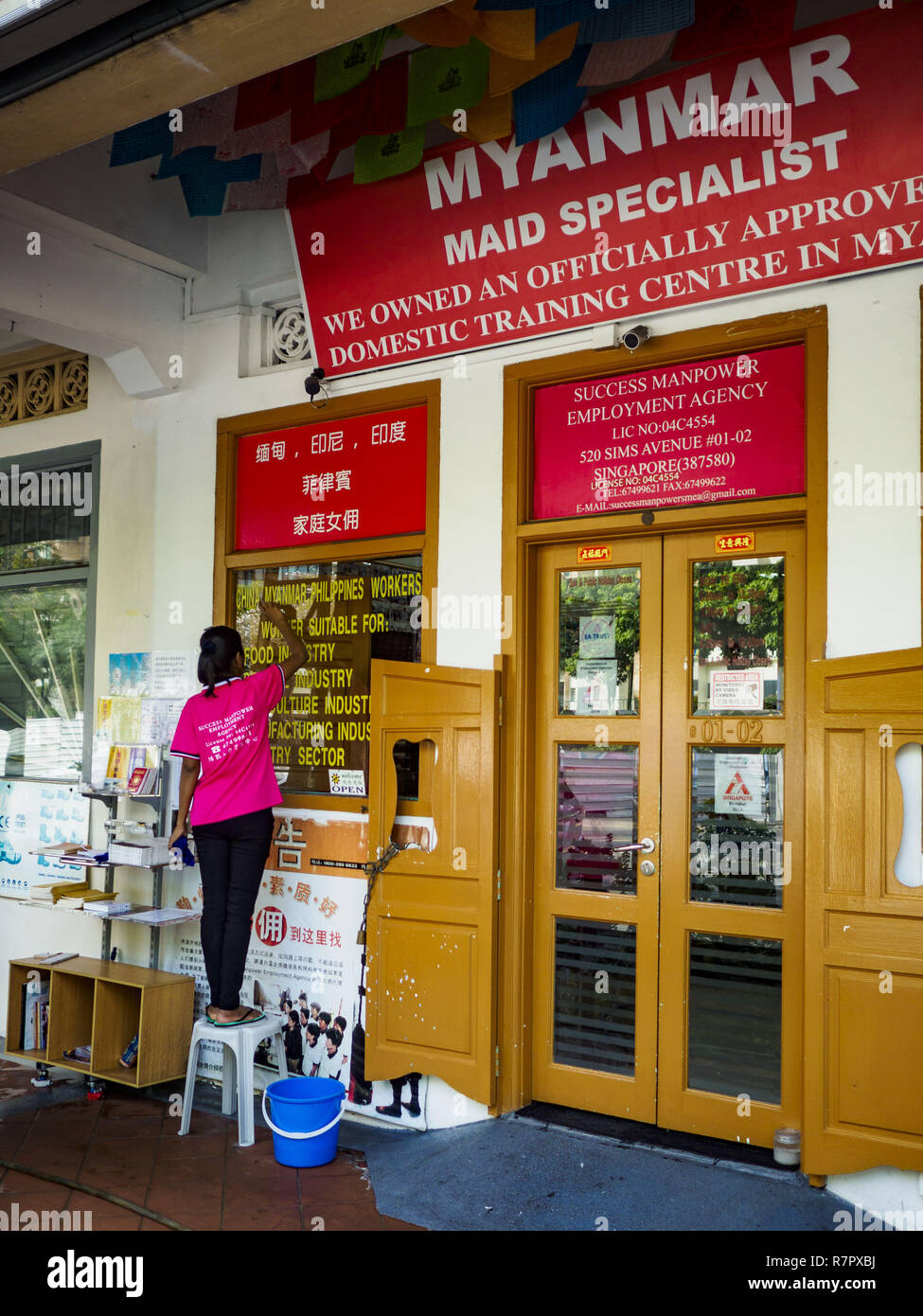 Singapore, Singapore. 11th Dec, 2018. An employment agency in the Geylang neighborhood that specializes in placing Burmese women as domestic servants in Singapore. The Geylang area of Singapore, between the Central Business District and Changi Airport, was originally coconut plantations and Malay villages. During Singapore's boom the coconut plantations and other farms were pushed out and now the area is a working class community of Malay, Indian and Chinese people. In the 2000s, developers started gentrifying Geylang and new housing estate developments were built. (Credit Image: © Jack K Stock Photo