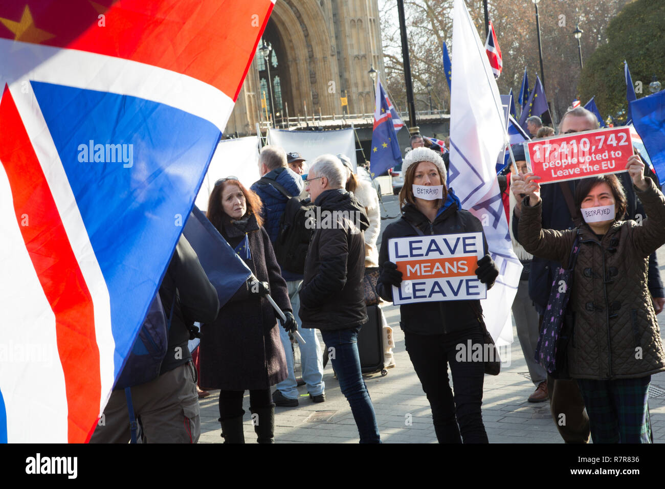 London UK 11th Dec 2018 Pro Brexit protesters demonstrate with placards outside the Houses of Parliament. Credit: Thabo Jaiyesimi/Alamy Live News Stock Photo