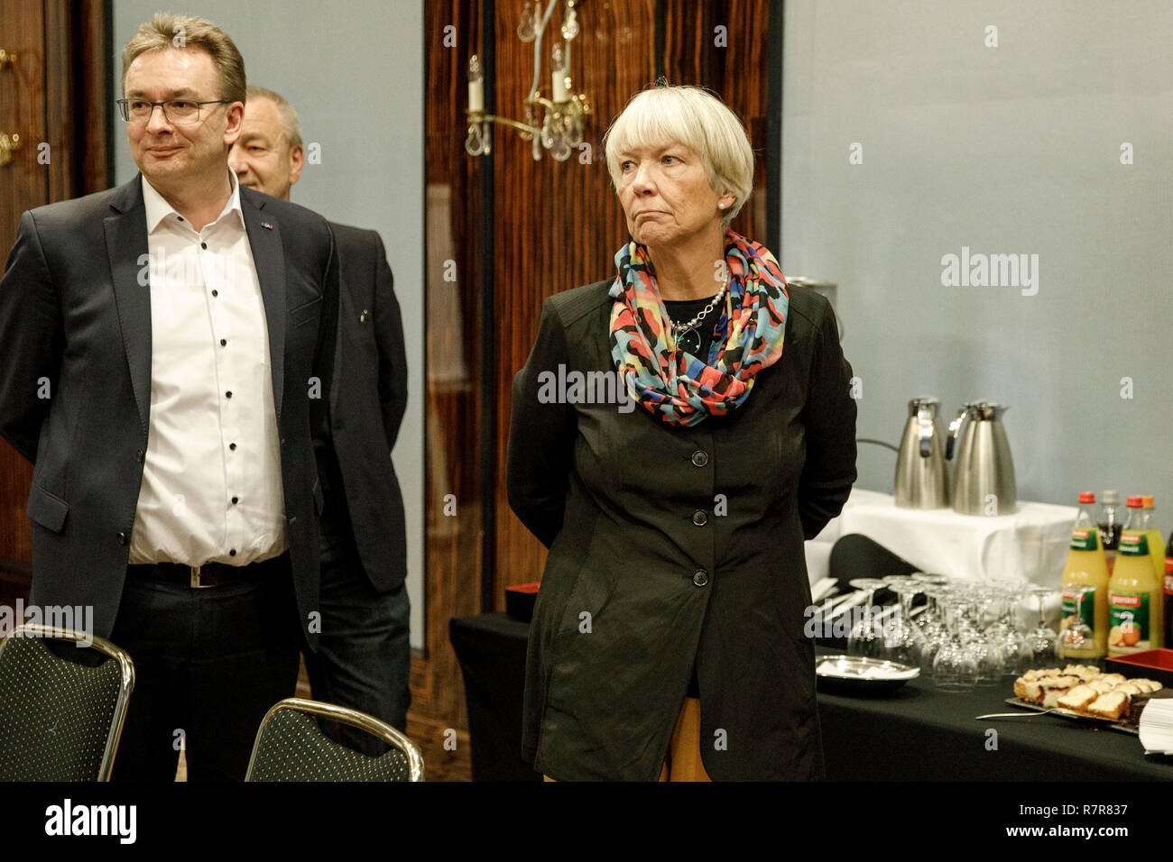 Berlin, Germany. 11th Dec, 2018. Regina Rusch-Ziemba (r), Vice-Chairwoman of the Railway and Transport Union (EVG) and EVG negotiator, is standing next to Torsten Westphal (l), Federal Managing Director of EVG, before the start of the collective bargaining talks between the Railway and Transport Union (EVG) and Deutsche Bahn. Credit: Carsten Koall/dpa/Alamy Live News Stock Photo