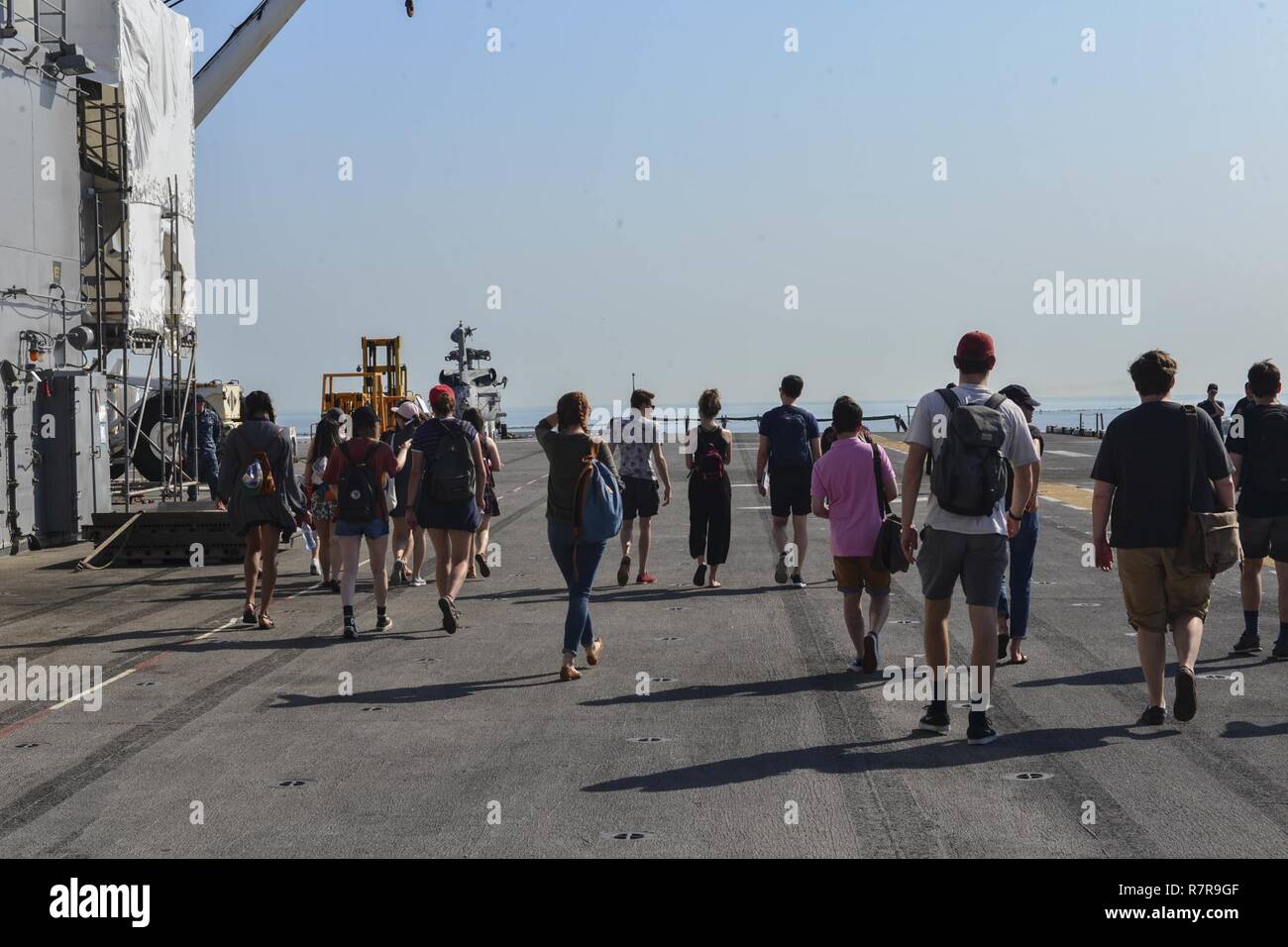 MAYPORT, Fla. (March 29, 2017) - Students from the Department of Geography at University College London tour the flight deck of the amphibious assault ship USS Iwo Jima (LHD 7). Iwo Jima recently returned to her homeport after conducting a series of certifications and qualifications. Stock Photo