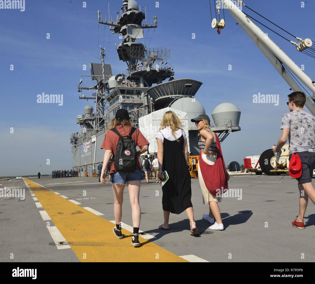 MAYPORT, Fla. (March 29, 2017) - Students from the Department of Geography at University College London tour the flight deck of the amphibious assault ship USS Iwo Jima (LHD 7). Iwo Jima recently returned to her homeport after conducting a series of certifications and qualifications in preparation for future deployments. Stock Photo