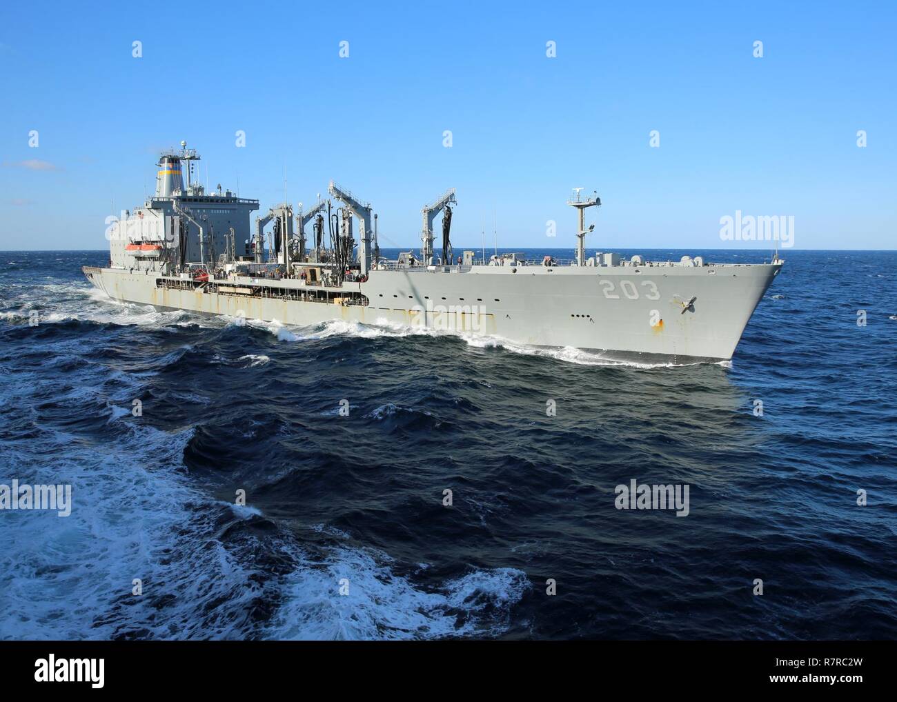 ATLANTIC OCEAN (March 23, 2017) The Military Sealift Command fleet replenishment oiler USNS Laramie (T-AO 203) pulls along-side the fast combat support ship USNS Arctic (T-AOE 8) during a replenishment-at-sea. Stock Photo