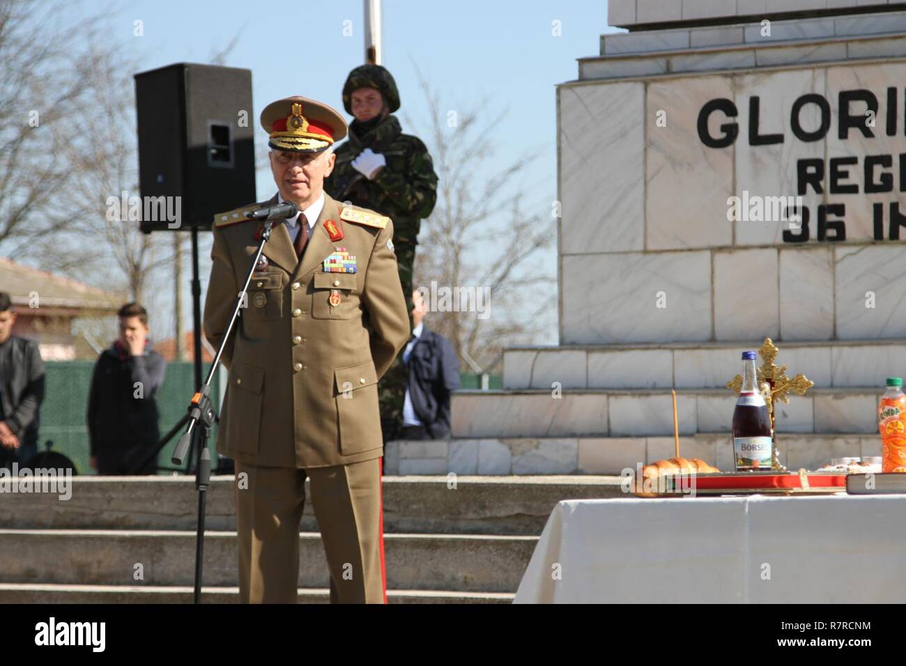Retired Romanian Lt. Gen. Virgil Balaceanu gives a speech in front of the  36th Infantry Regiment Memorial at Mihail Kogalniceanu Air Base, Romania on  April 1, 2017. Balaceanu served as the commander