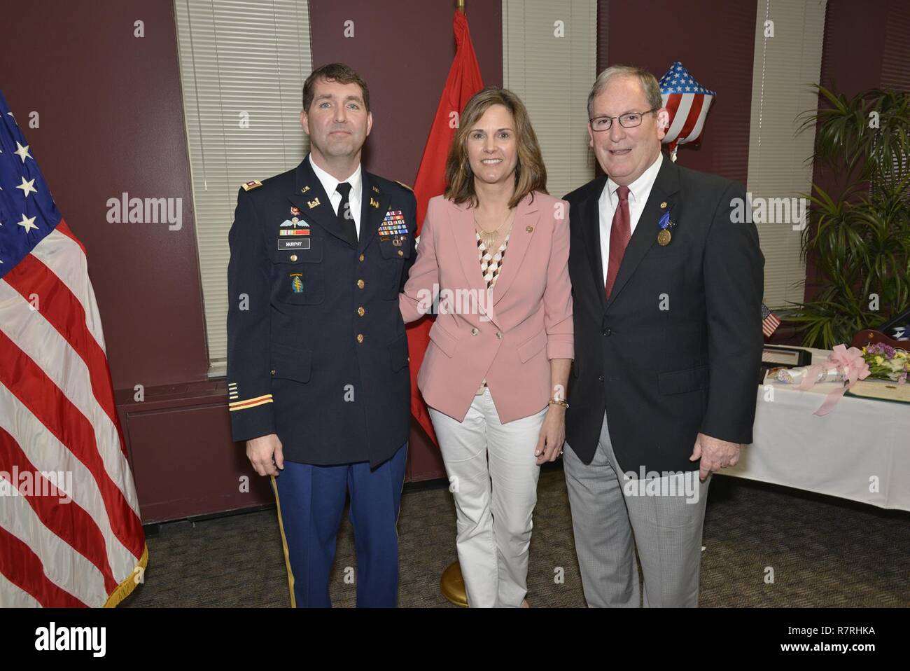 Lt. Col. Stephen Murphy, U.S. Army Corps of Engineers Nashville District commander, thanks Cady Wilson for supporting her husband Mike Wilson, Nashville District deputy district engineer for Project Management, during his retirement ceremony at the district headquarters in Nashville, Tenn., March 31, 2017. (USACE Stock Photo