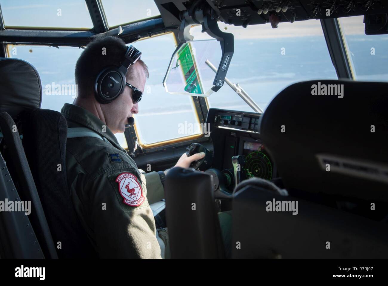 Capt. Nick Foreman, 815th Airlift Squadron pilot, flies a C-130J