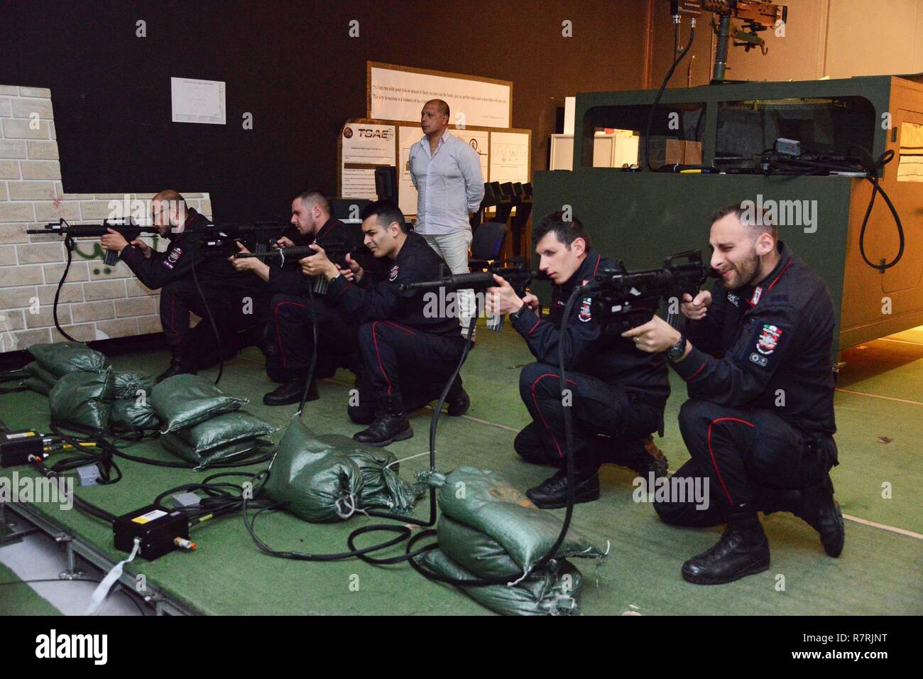 Italian Carabinieri of the 13th Regiment Carabinieri “ Friuli Venezia Giulia” Gorizia, conduct training using Engagement Skills Trainer (EST) at Caserma Ederle Vicenza, Italy, April 4, 2017. Carabinieri use U.S. Army RTSD South equipment to enhance bilateral relations and to expand levels of cooperation and the capacity of the personnel involved in joint operations. Stock Photo