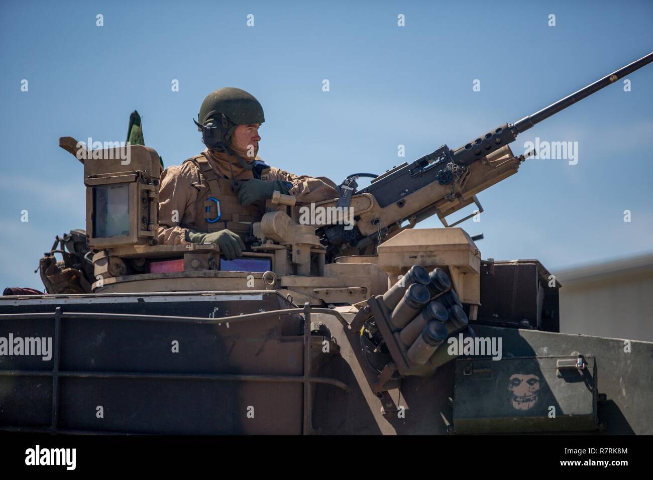 Major Gen. John K. Love sits atop an M1A1 Abrams Tank at Camp Lejeune, N.C., April 5, 2017. Love spent time interacting with the Marines of Bravo Company, 2nd Tank Battalion while controlling a tank and its various weapons systems. Love is the commanding general of 2nd Marine Division. Stock Photo