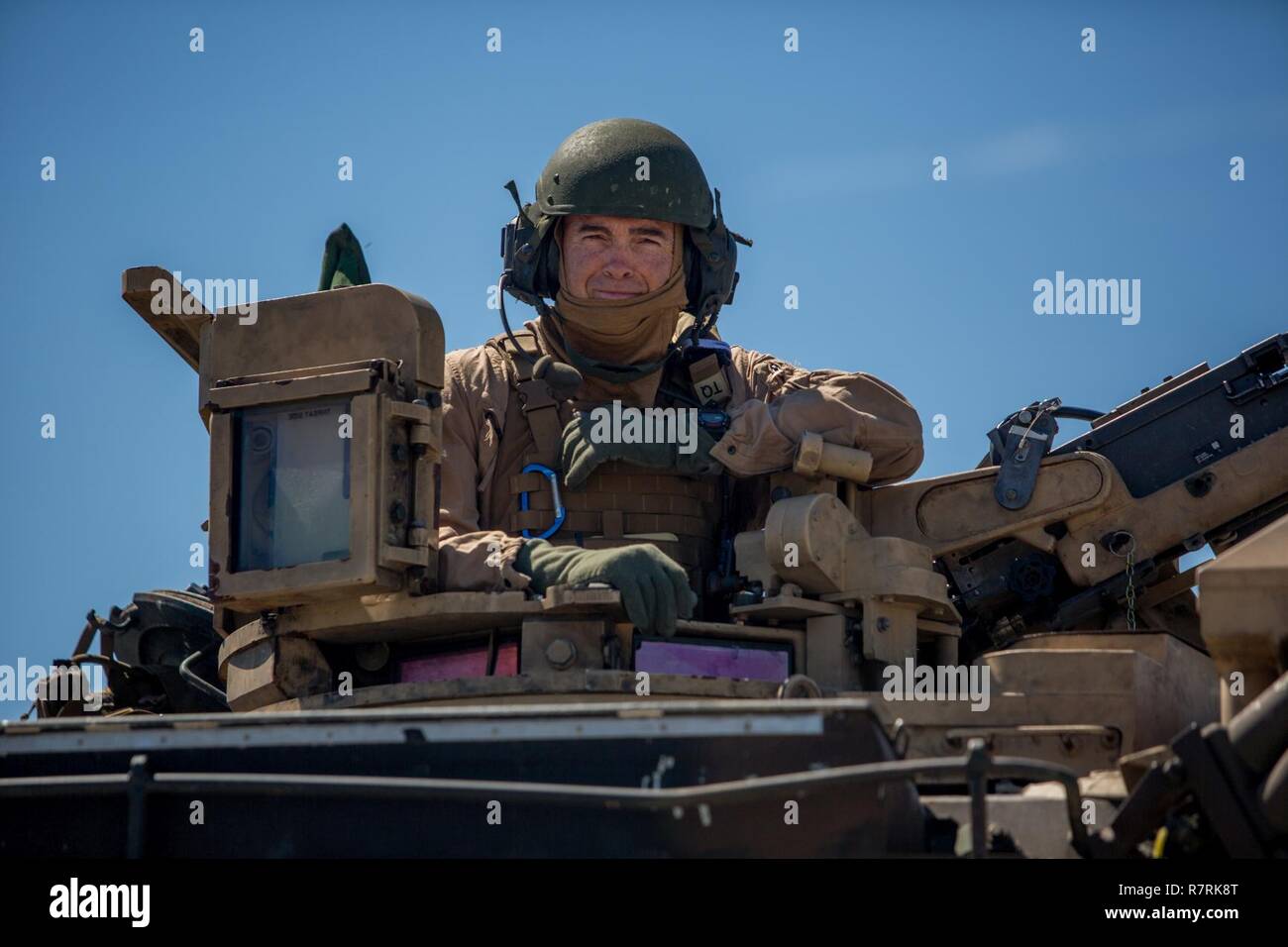 Major Gen. John K. Love sits atop an M1A1 Abrams Tank at Camp Lejeune, N.C., April 5, 2017. Love spent time interacting with the Marines of Bravo Company, 2nd Tank Battalion while controlling a tank and its various weapons systems. Love is the commanding general of 2nd Marine Division. Stock Photo