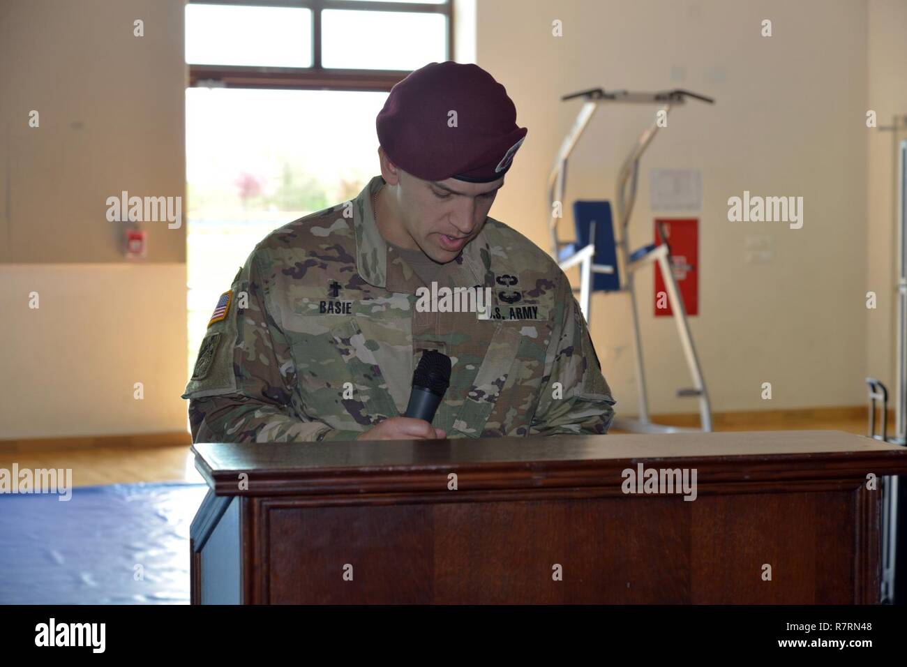 Capt. Michael J. Basie, Chaplain of 173rd Airborne Brigade, gives the invocation, during the change of responsibility ceremony for Company C, 54th Brigade Engineer Battalion at Caserma Del Din in Vicenza, Italy, on Apr. 5, 2017. The 173rd Airborne Brigade based in Vicenza, Italy, is the Army Contingency Response Force in Europe, and is capable of projecting forces to conduct the full of range of military operations across the United State European, Central and Africa Commands areas of responsibility. Stock Photo