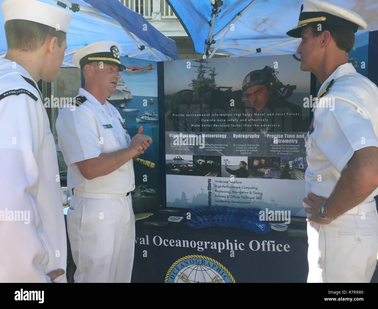 Aerographer's Mate First Class Nicholas Vojak (left) Lt. Justin Shaw