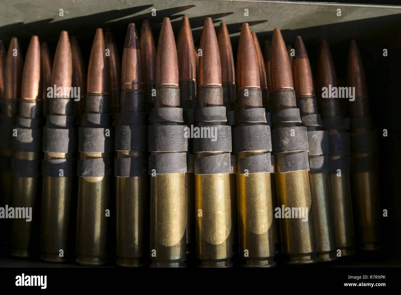 Ammunition cans full of 7.62mm rounds for the M2A3 Bradley Fighting Vehicle's M240C machine gun sit at the ammo point of the 3rd Armored Brigade Combat Team's Table VI qualifications at the Udairi Range Complex March 27. The brigade tank and Bradley crews spent about two weeks in the field conducting sustainment gunnery to ensure all the crews qualified at day and night fire to maintain proficiency. Stock Photo