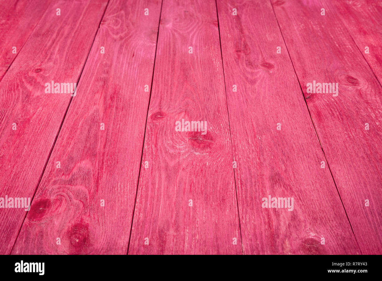 Pink wooden background. Old painted boards. Closeup Stock Photo