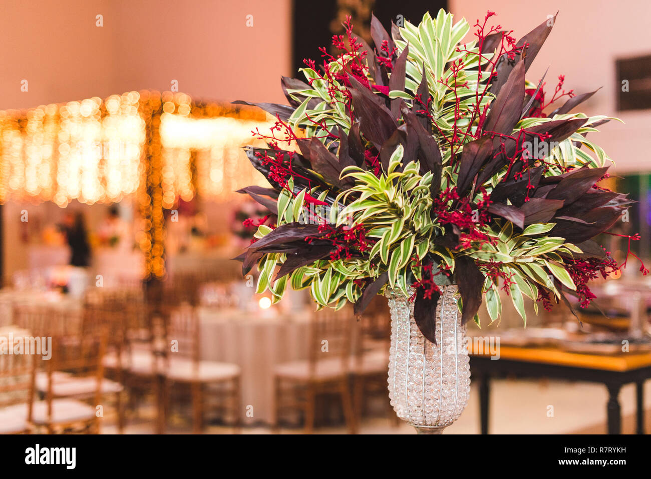 Arrangement of flowers in event decoration. Stock Photo