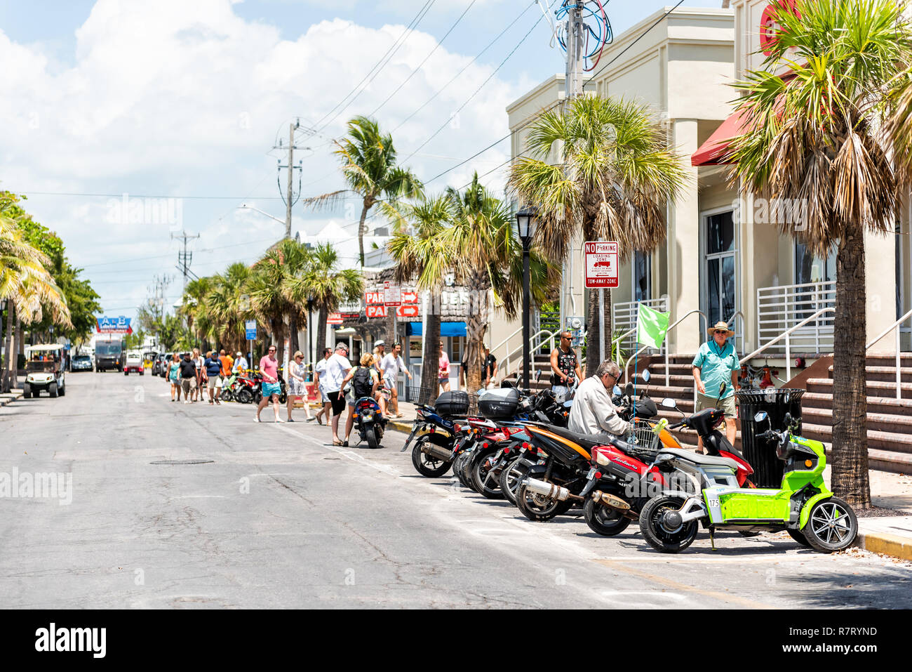 Key West, USA May 1, 2018 Scooters motor bikes parked on Duval