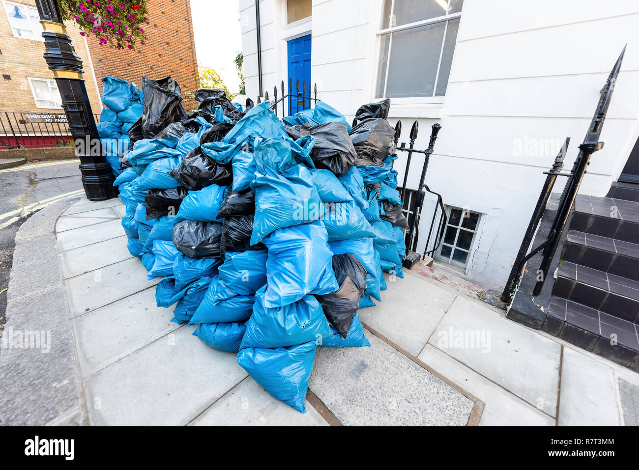 Neighborhood district of Pimlico with street, many blue pile heap of