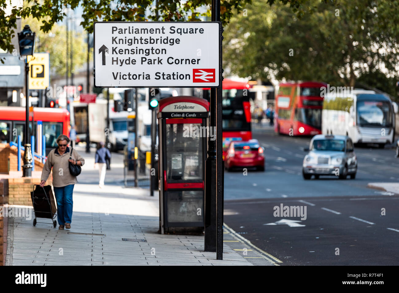 London, UK - September 15, 2018: United Kingdom, Pimlico Westminster neighborhood district, sign directions to Parliament Square, Victoria station, ur Stock Photo