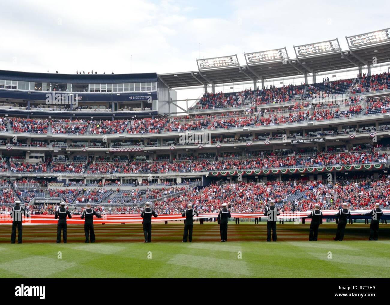 WASHINGTON (April. 3, 2017) Sailors assigned to the U.S. Navy Ceremonial Guard take part in an opening day ceremony during a Washington Nationals baseball game. Stock Photo