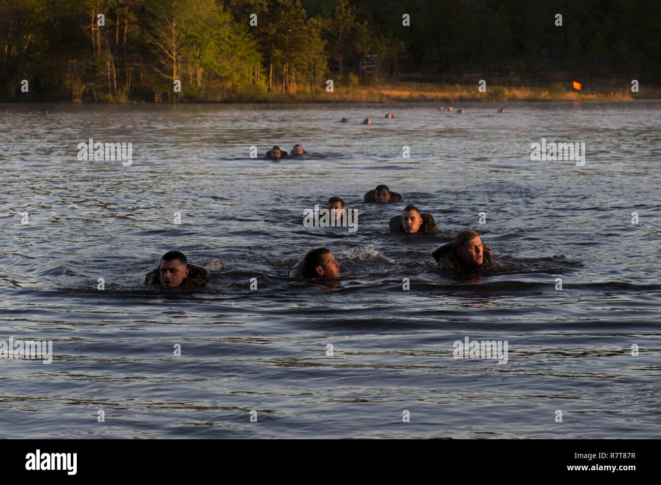 U.S. Army rangers participate in a pond swim event during the Best