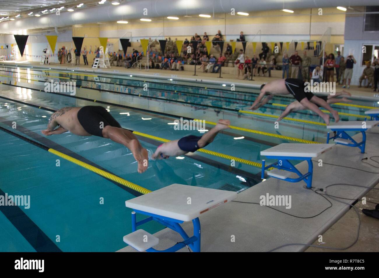 U.S. Army Soldiers and veterans competing in the swimming event at the ...