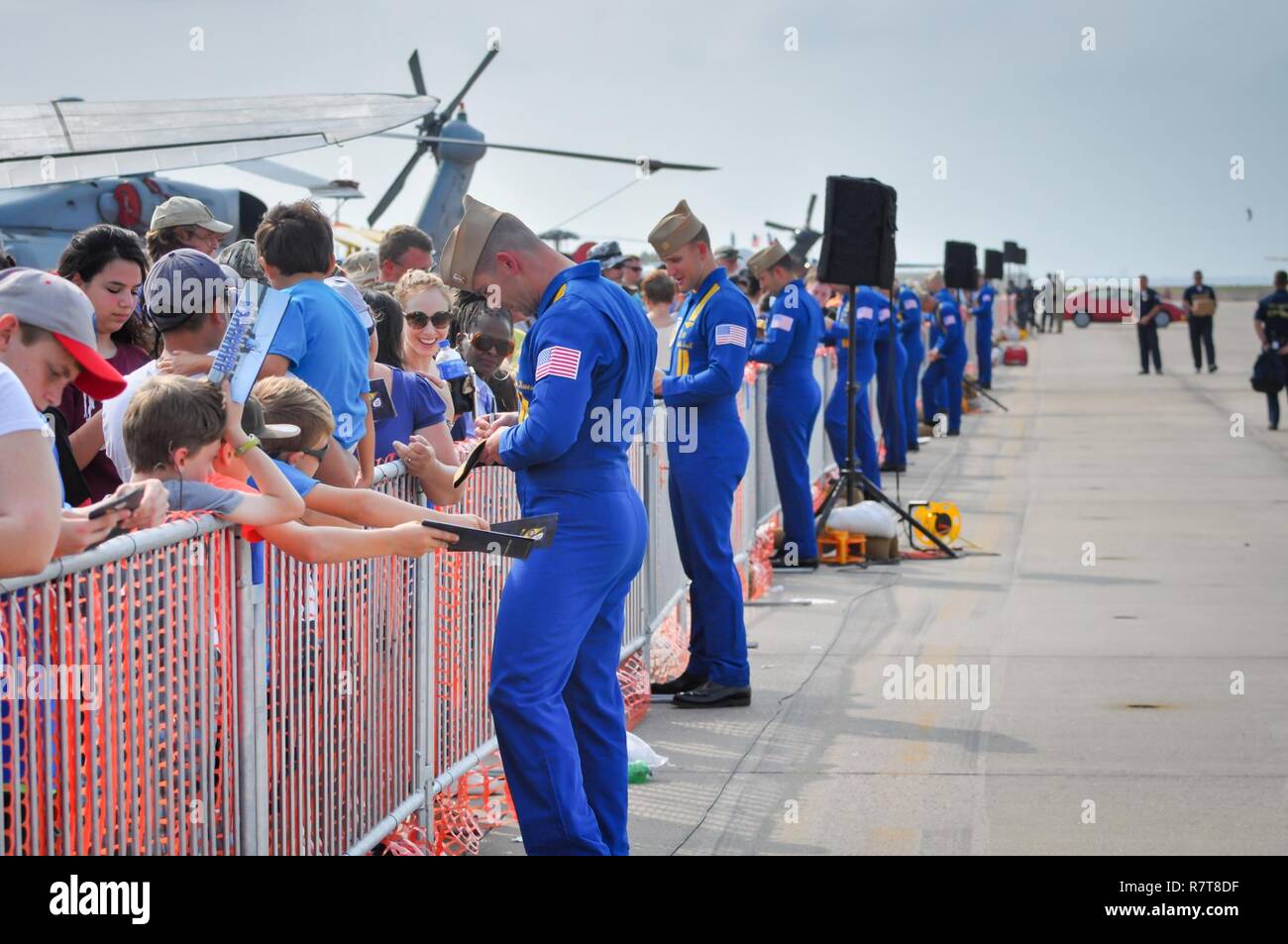 Member of the U.S. Navy's Blue Angels meet and sign autographs for fans
