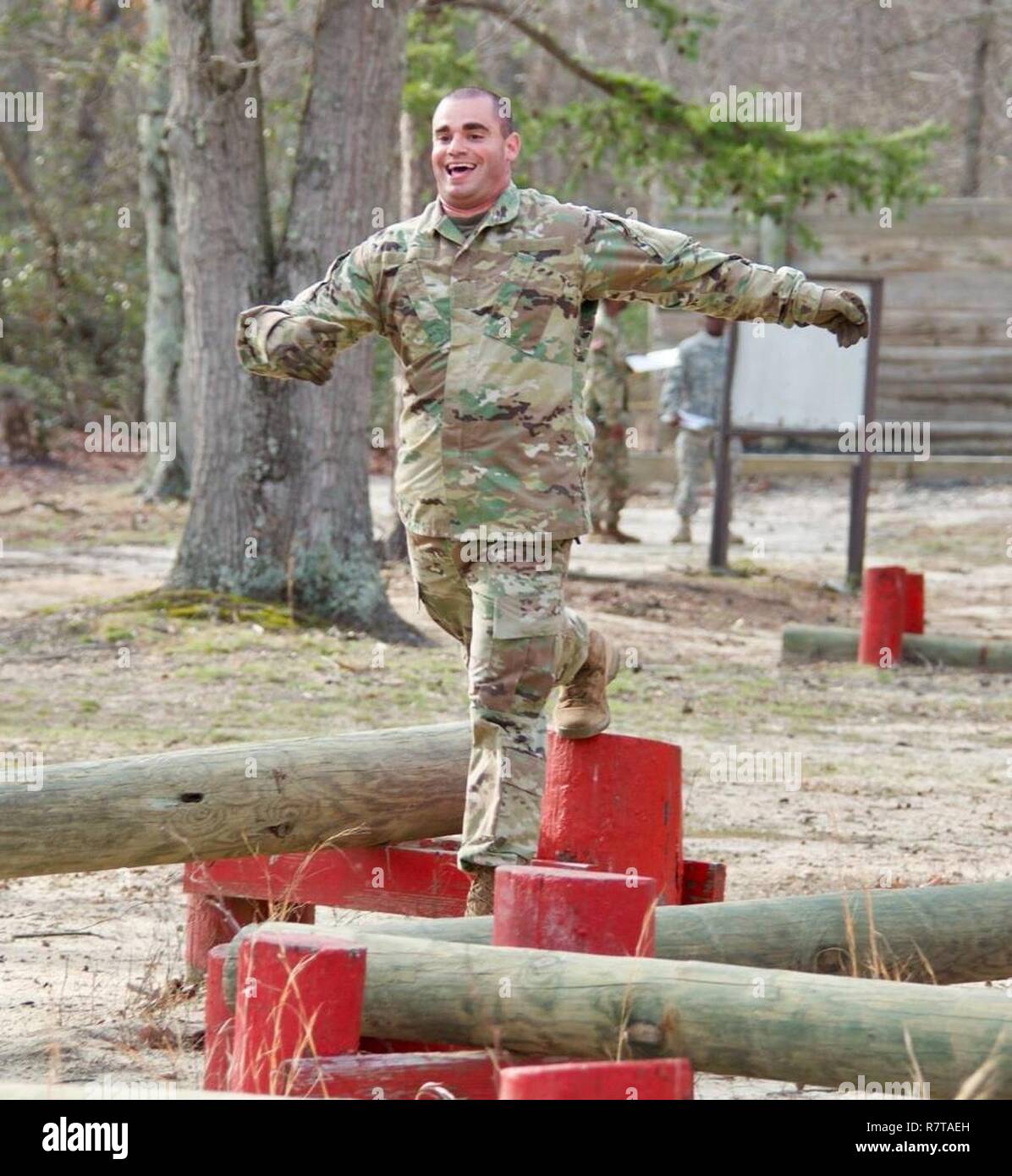 Army Reserve Soldiers with the Military Intelligence Readiness Command in conjunction with the 83rd Army Reserve Readiness Training Center, conquered the obstacle course challenge at the 2017 Joint Best Warrior Competition. This competition not only test the physical facets of a Soldier, it also focuses on Warrior tasks, mental aptitude and a myriad of other specific tasks to ensure mission readiness. They push past their comfort zone and give their all; in hopes of representing their unit at the U.S. Army Reserve Best Warrior Competition later in the year. They truly are on the 'Road to Aweso Stock Photo