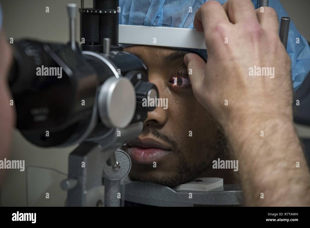 SAN DIEGO (April 6, 2017) A patient has his eyes checked after ...