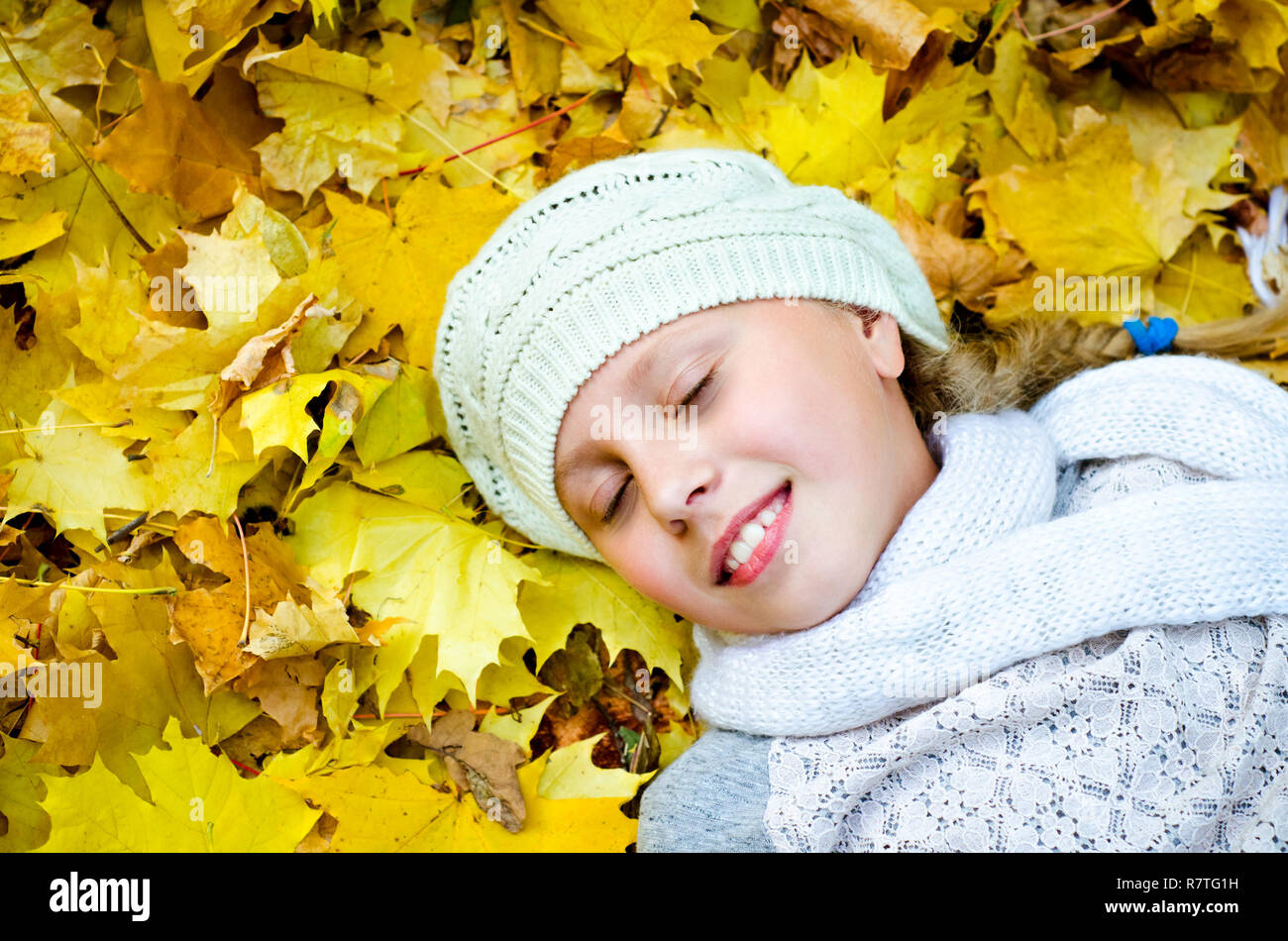 little girl with autumn leaves Stock Photo - Alamy