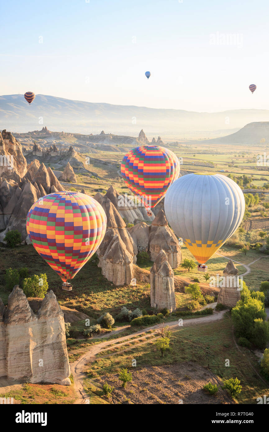 Hot air ballons over Love Valley near Goreme and Nevsehir in the center of Cappadocia, Turkey. This shot taken shortly after sunrise from a balloon. Stock Photo