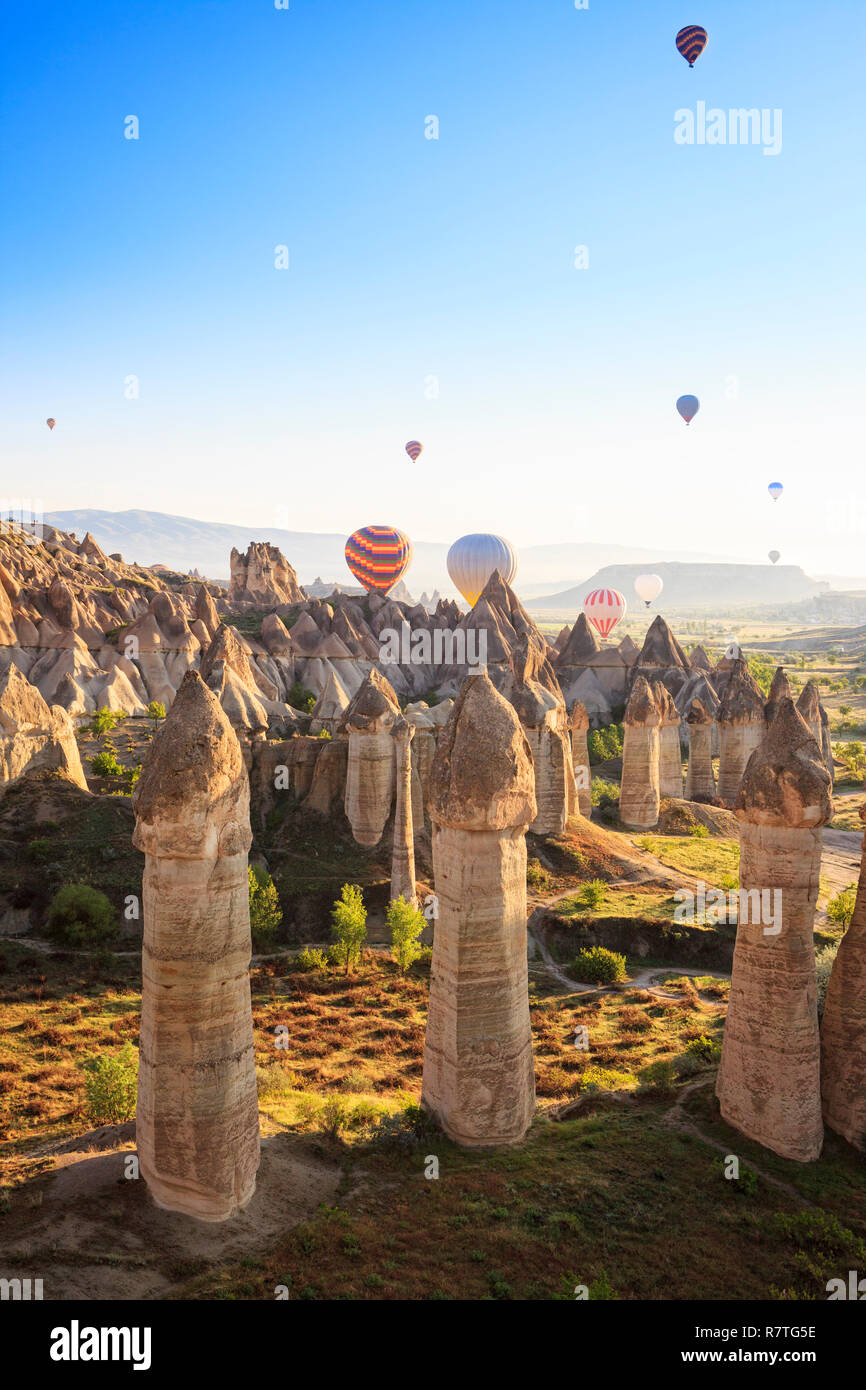 Hot air ballons over Love Valley near Goreme and Nevsehir in the center of Cappadocia, Turkey. This shot taken shortly after sunrise from a balloon. Stock Photo