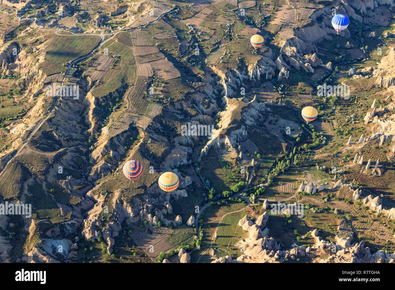 Aerial view of hot air ballons over Love Valley near Goreme and Nevsehir in the center of Cappadocia, Turkey. This shot taken from a balloon. Stock Photo