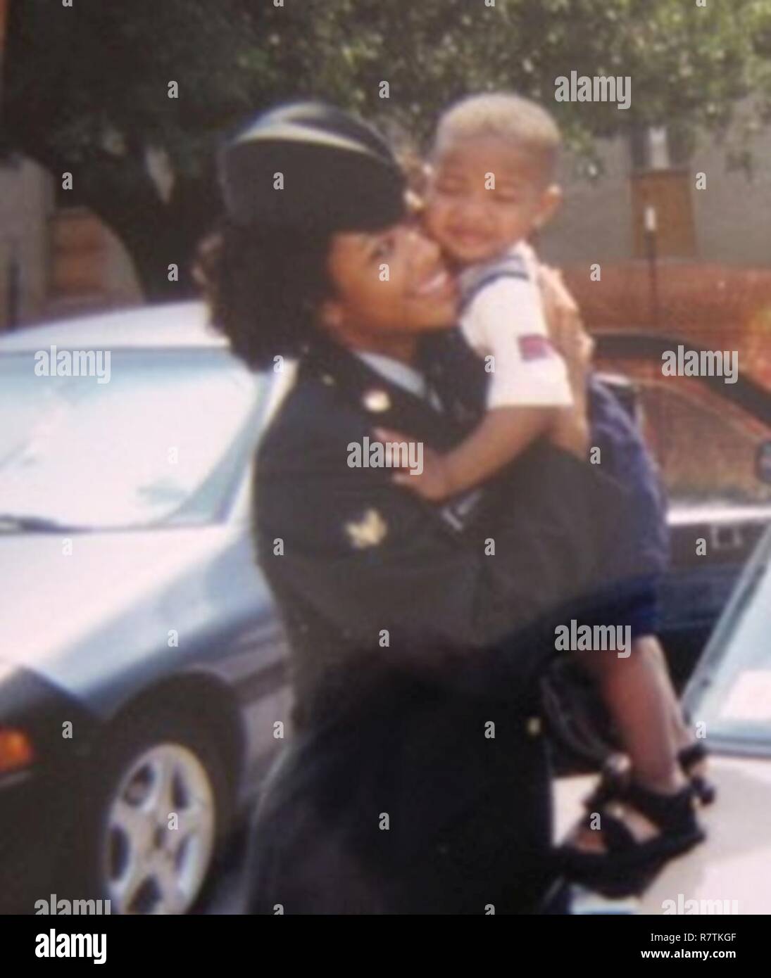 Capt. Andrea Wolfe holds her 2-year-old son, Kameron, in this undated personal photo. Kameron is now 20 years old and serving in the Army alongside his mother. Currently the two are deployed together to Camp Buehring, Kuwait, for nine months. Stock Photo