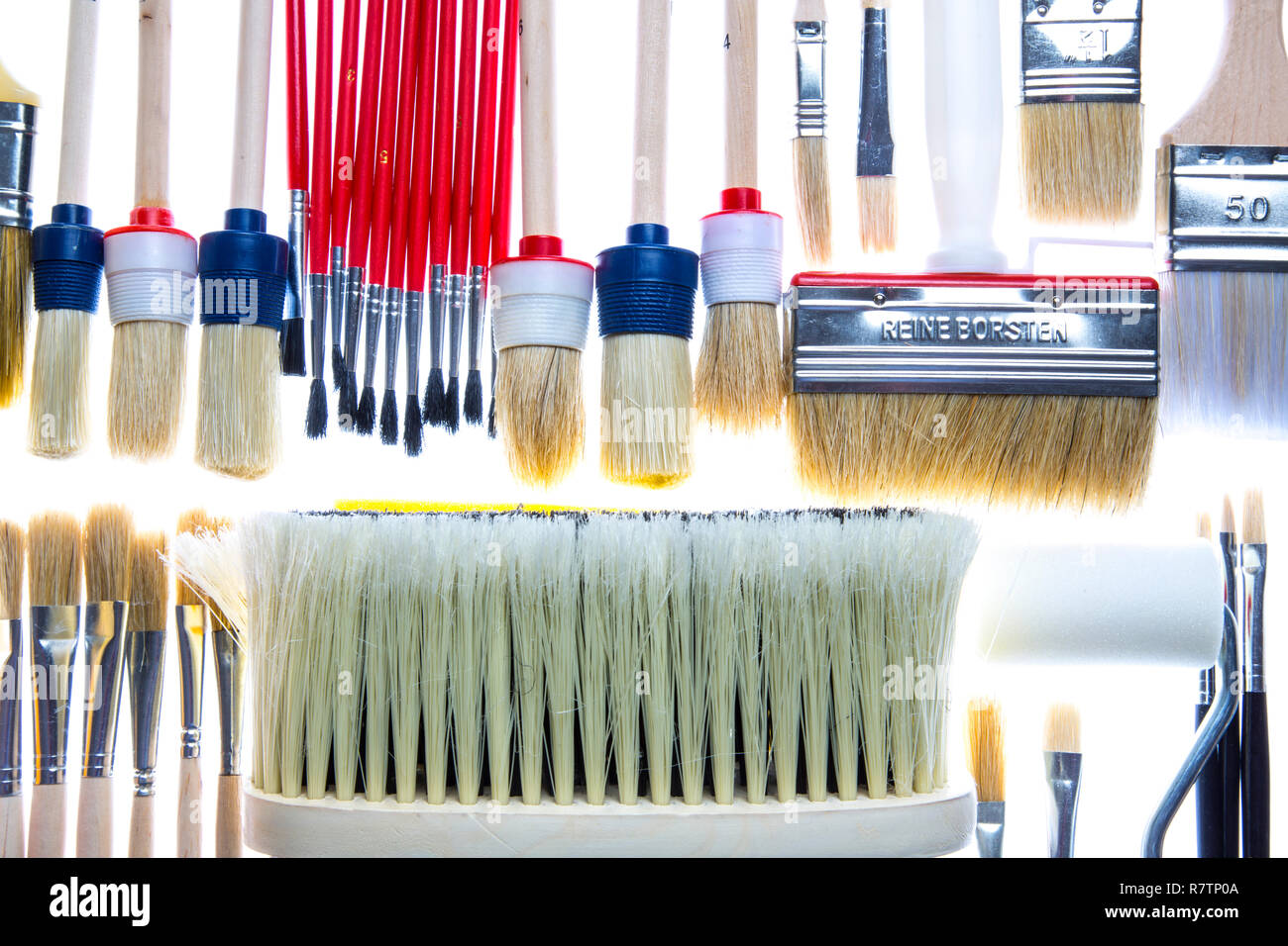Different types of brushes and a paint roller Stock Photo Alamy