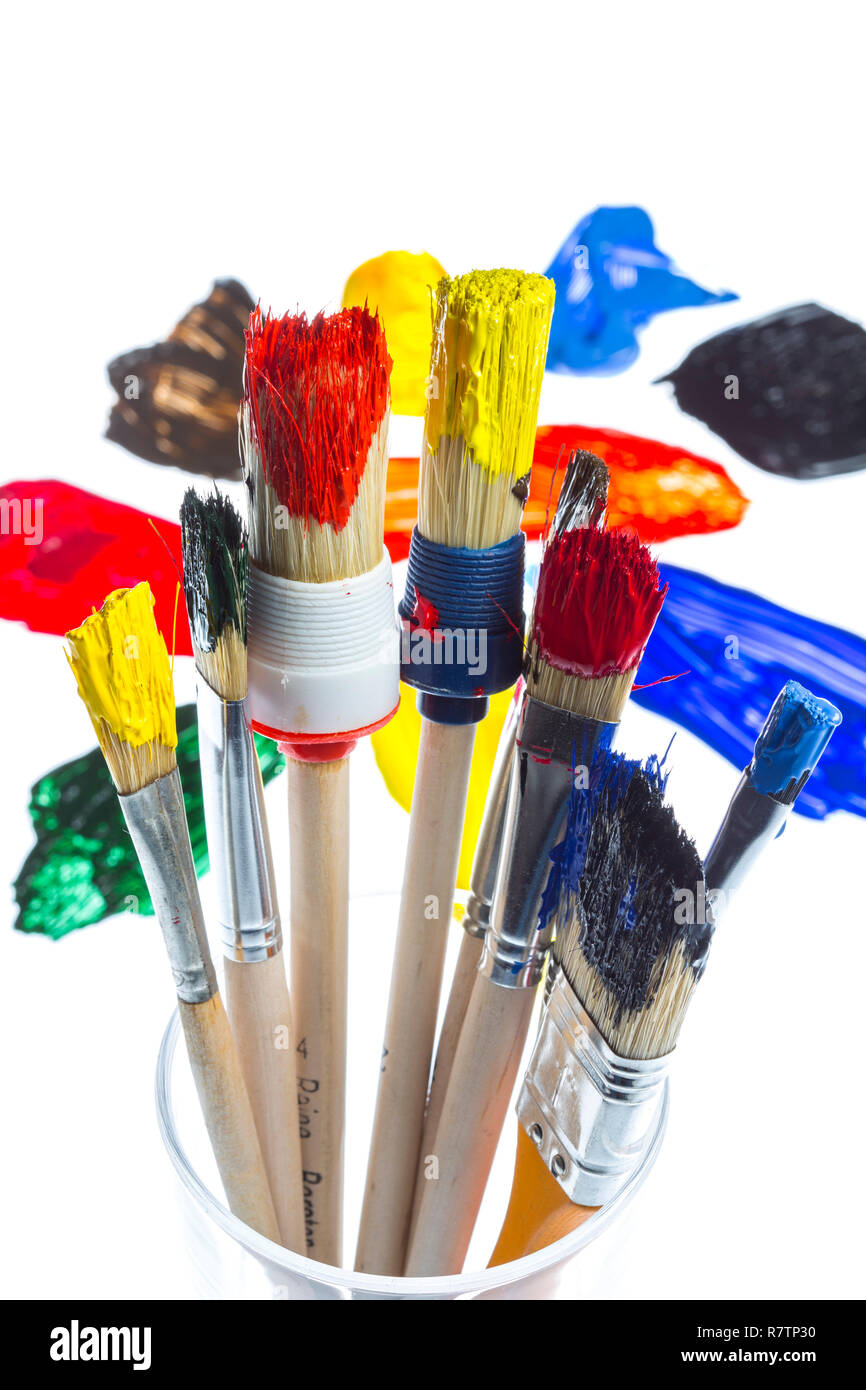 Different types of brushes with colourful acrylic paints Stock Photo