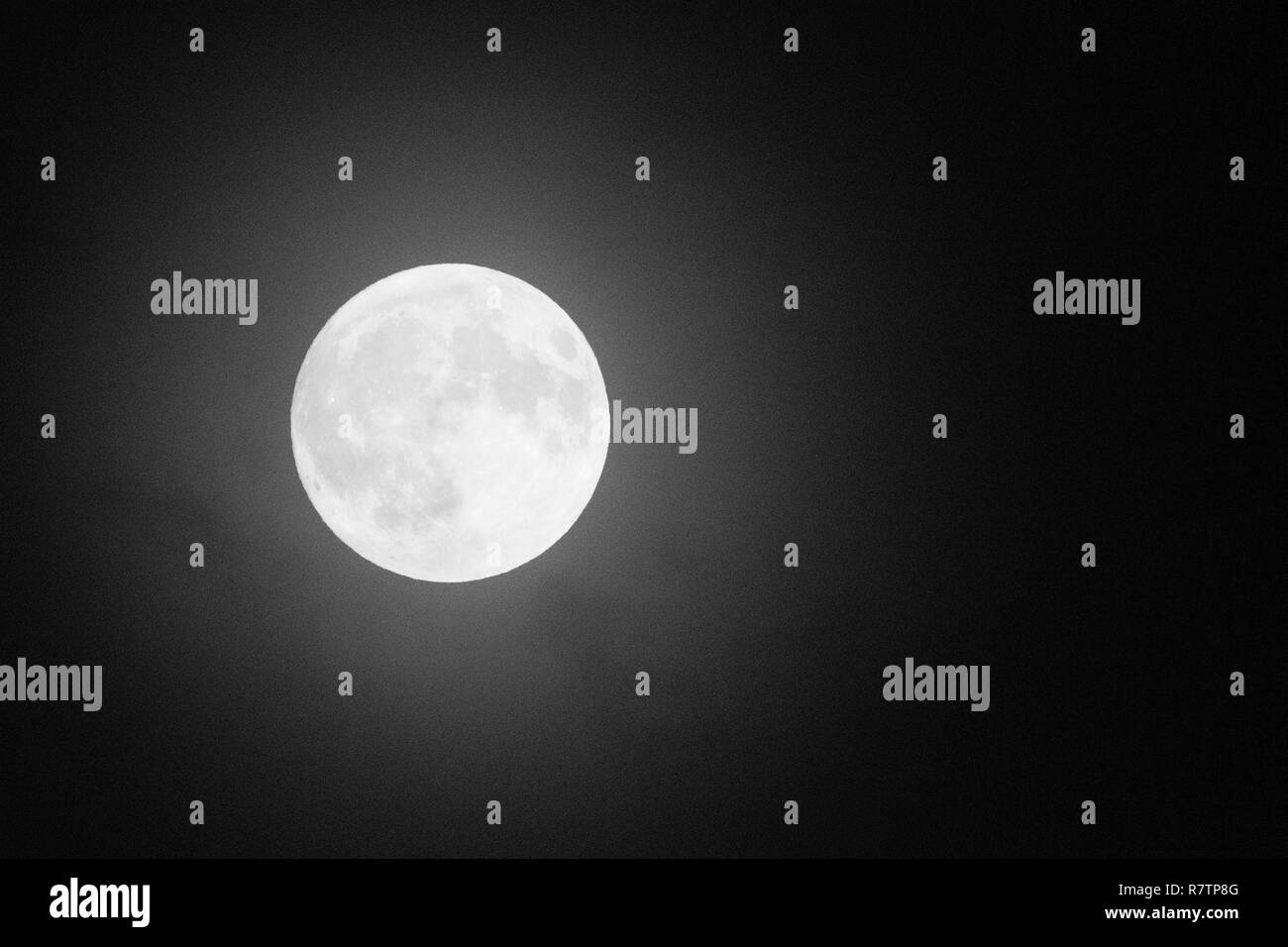 Full Moon and clouds on the night sky Stock Photo - Alamy
