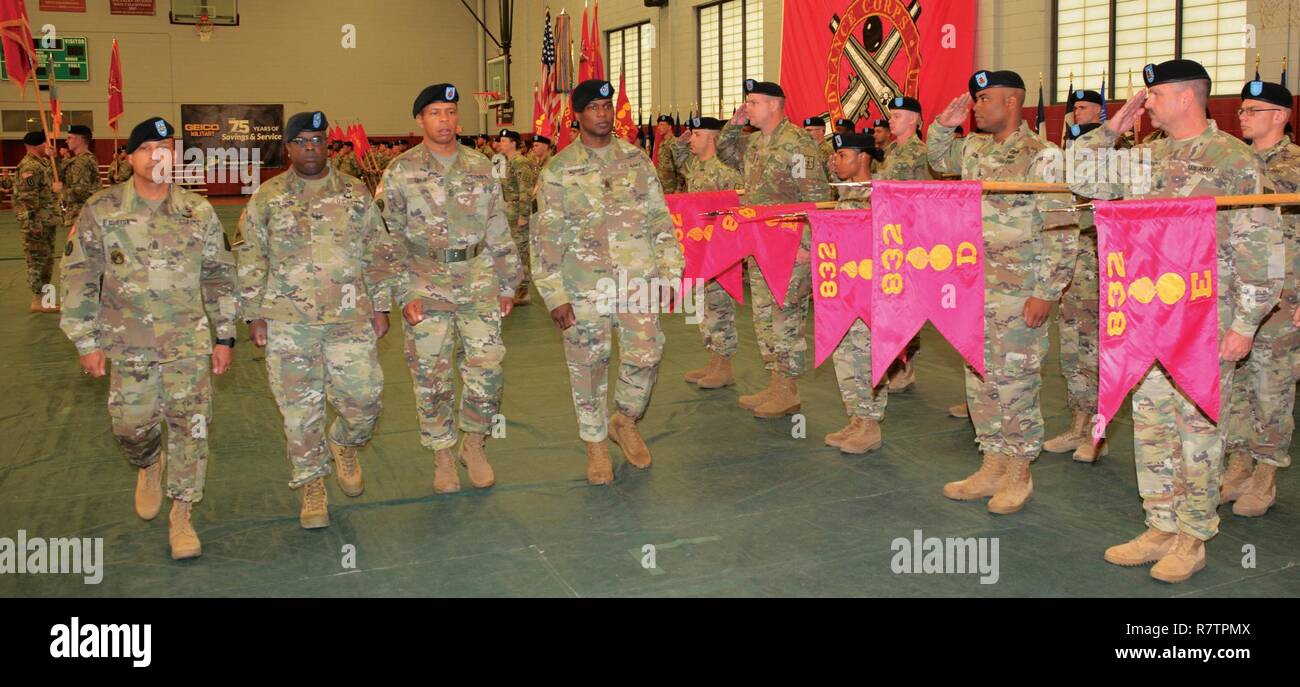 Senior Ordnance Corps leaders inspect the troops during a March 24 change of responsibility ceremony in Fort Lee's MacLaughlin Fitness Center. Command Sgt. Maj. Edward C. Morris, right,  relinquished his responsibilities as the corps' Regimental CSM to Command Sgt. Maj. Terry D. Burton, far left, a 28-year Soldier who hails from Roanoke. Col. David Wilson, 2nd from left, Chief of Ordnance, presided over the ceremony and the traditional passing of the regiment's noncommissioned officer sword and CSM charter to Burton. Also pictured with the senior leaders is Sgt. Maj. Roger Craig, commander of  Stock Photo