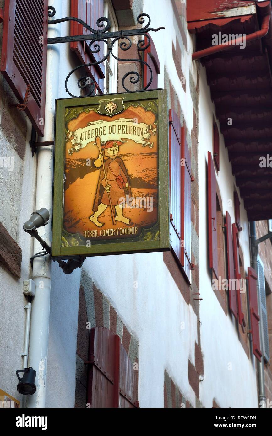 France, Pyrenees Atlantiques, Basque Country, Saint Jean Pied de Port, rue de la Citadelle on the Way of St. James, pilgrim's inn sign Stock Photo