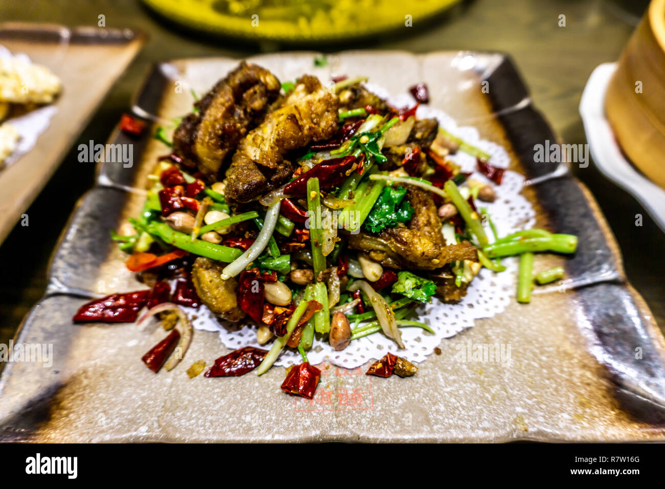 Traditional Grilled Chinese Lamb Chops with Vegetables on a Plate Stock