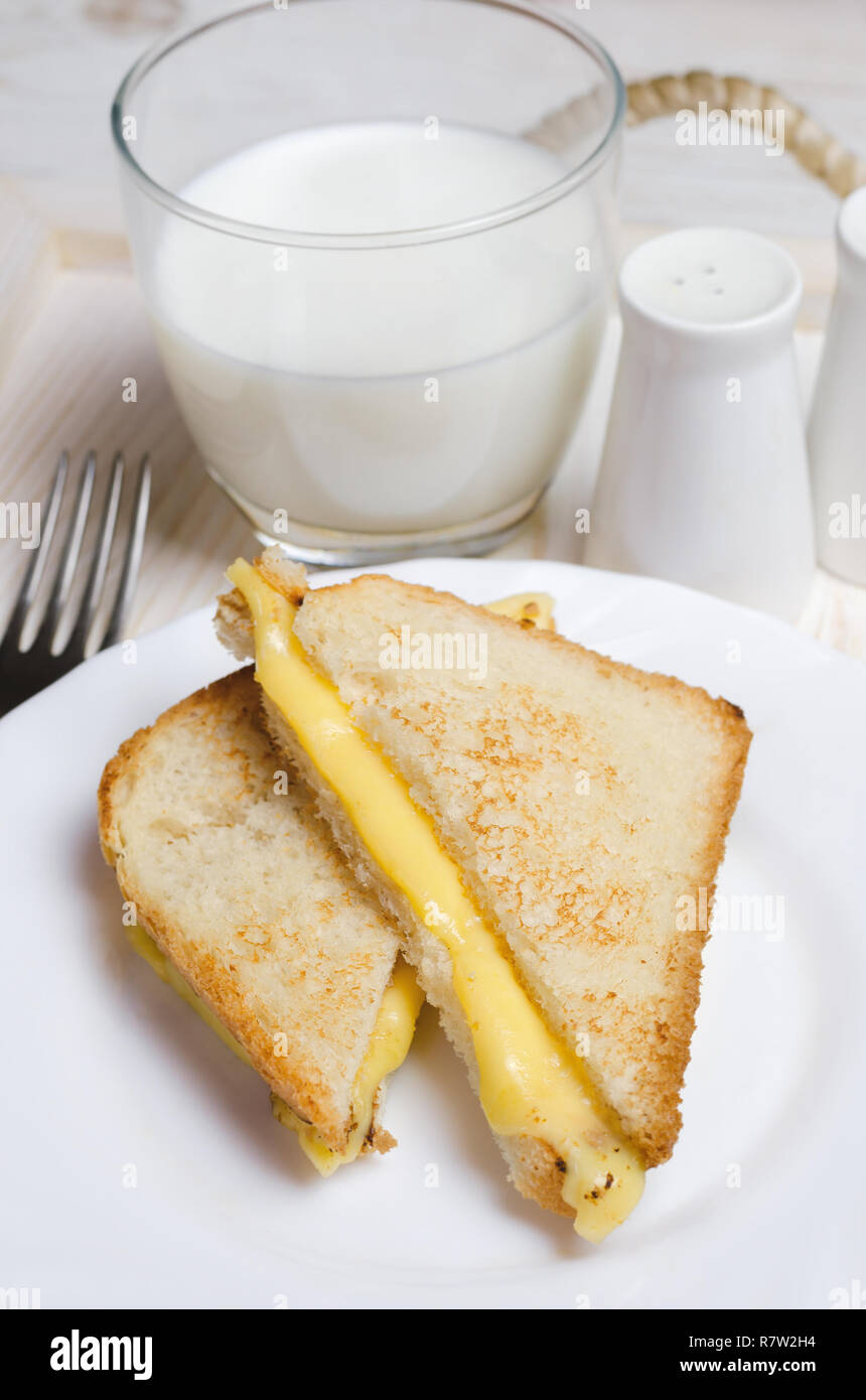 Homemade grilled cheese sandwich and milk for breakfast Stock Photo Alamy