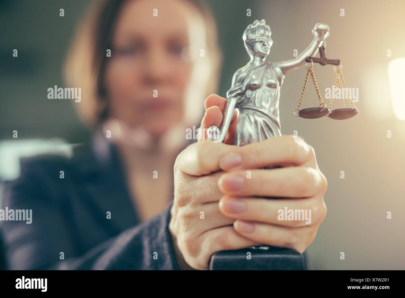 State attorney holding statue of Justice in office, selective focus Stock Photo