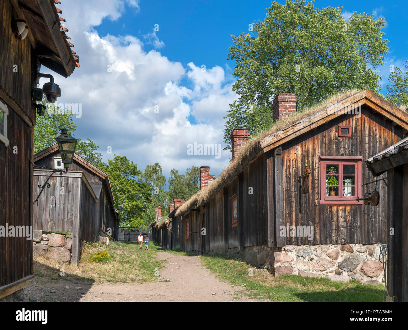 Tourists at the Luostarinmäki Handicrafts Museum, an area of 200 year old wooden buildings which survived the fire of 1827, Turku, Finland Stock Photo