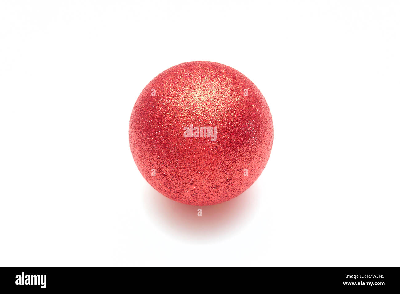 Red christmas ball hanging isolated on white background Stock Photo - Alamy