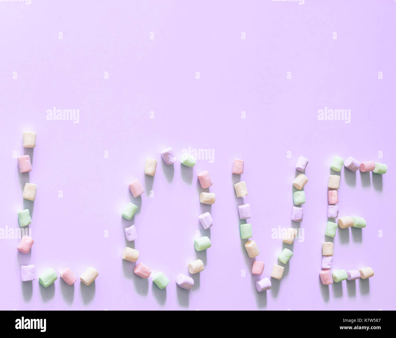 Inscription Love. marshmallows. flat lay Saint Valentine's. top view love. pastel shades. copy space Stock Photo
