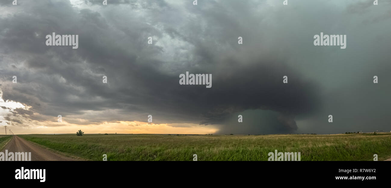Panoramic view of a supercell thunderstorm over the high plains in Oklahoma with a dramatic green sky Stock Photo