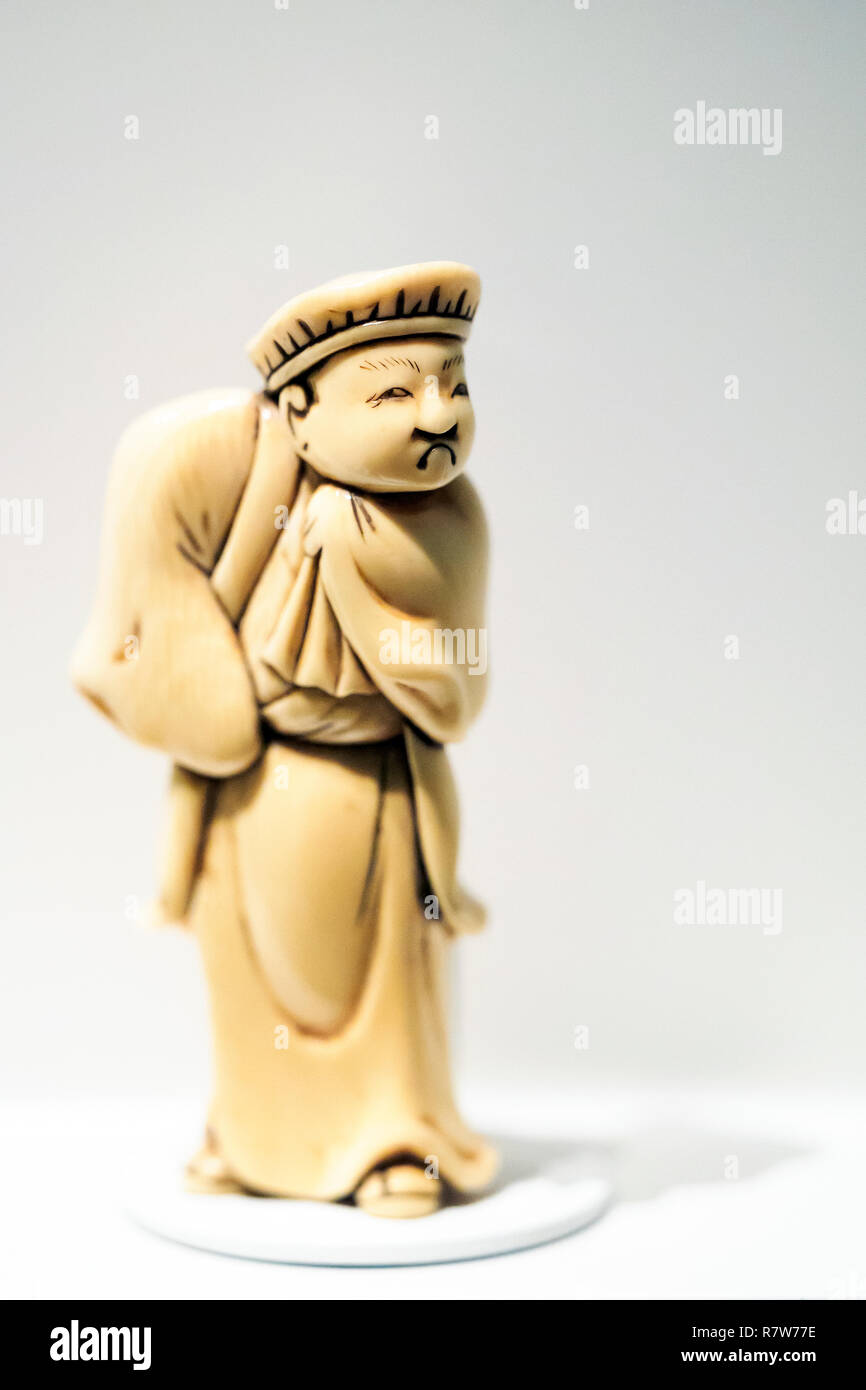 Chinese man Netsuke figurine Stock Photo