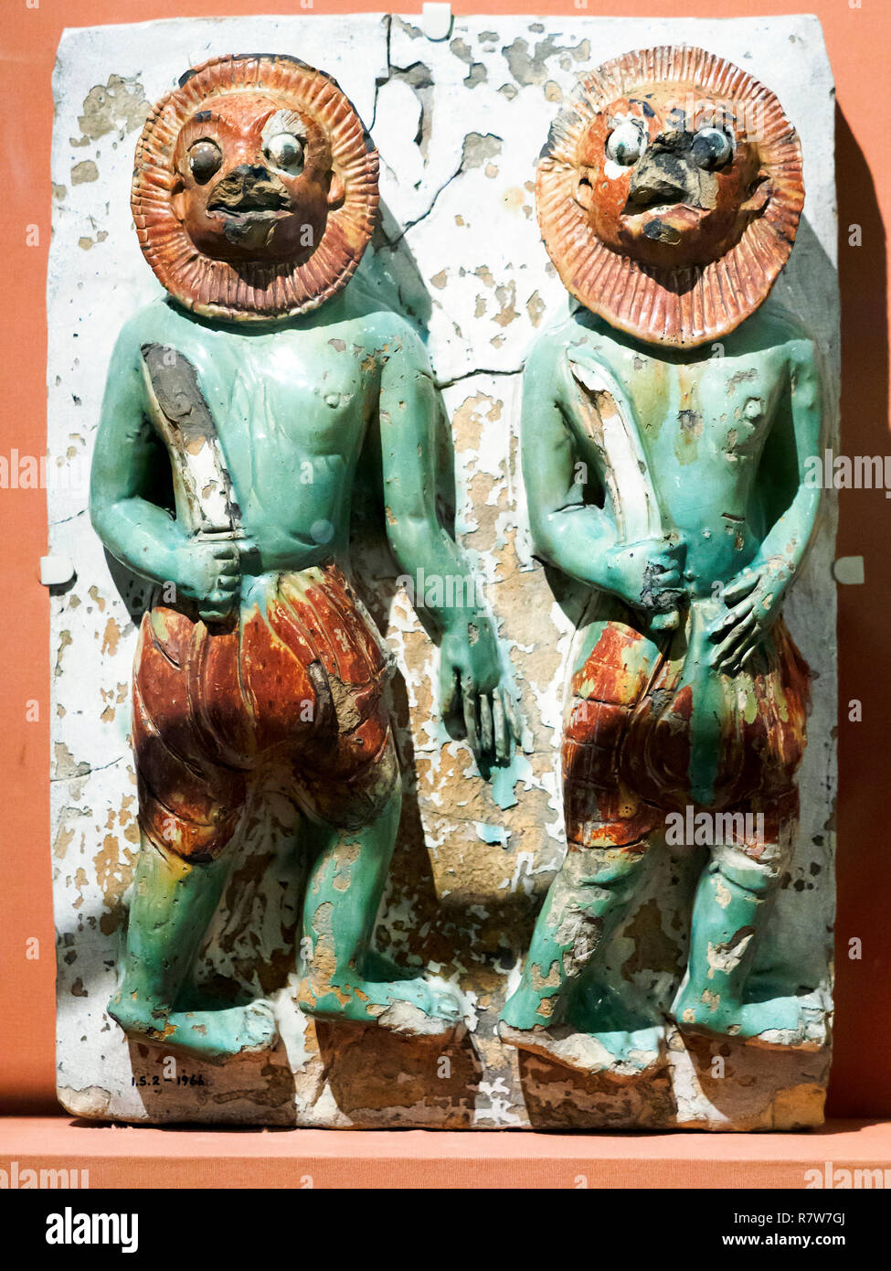 Tile showing the Warriors of Mara 1470-1500 Glazed stoneware  Burma (Pegu) Possibly from the Shwegugyi temple Stock Photo