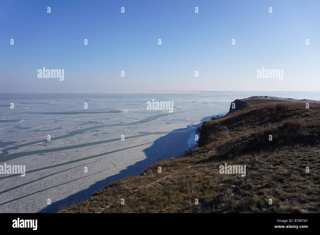Frozen lake in Jurilovca, background frozen, shapes in frozen lake Stock Photo