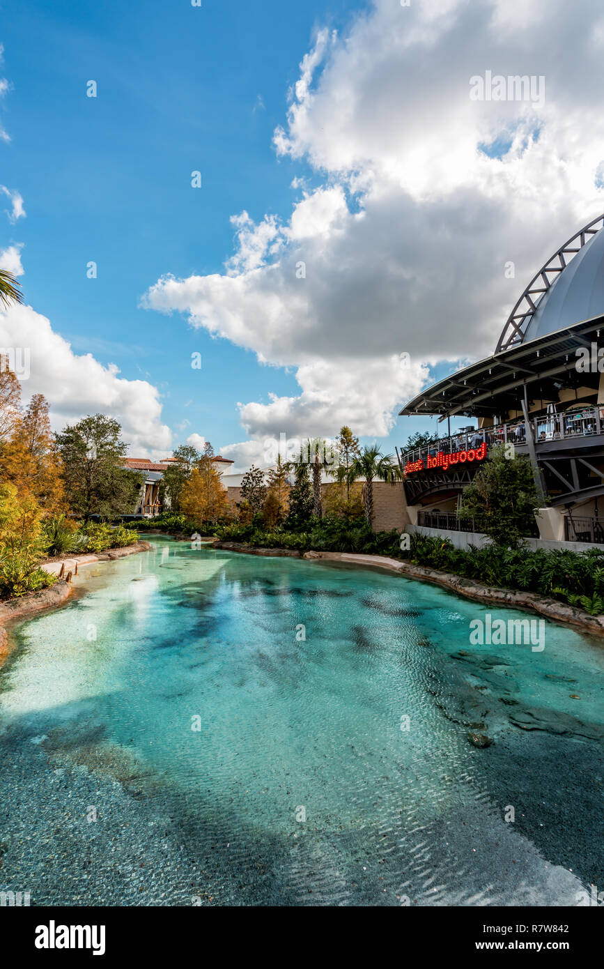 Orlando, Florida - December, 2017 - Planet Hollywood restaurant and artificial turquoise water lake at Orlando, Florida - December, 2017 - Colorful ar Stock Photo