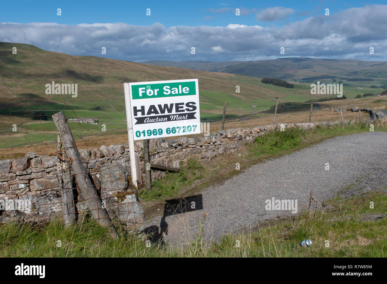 For Sale sign next to some farm land which is for sale. North Yorkshire, UK Stock Photo Alamy