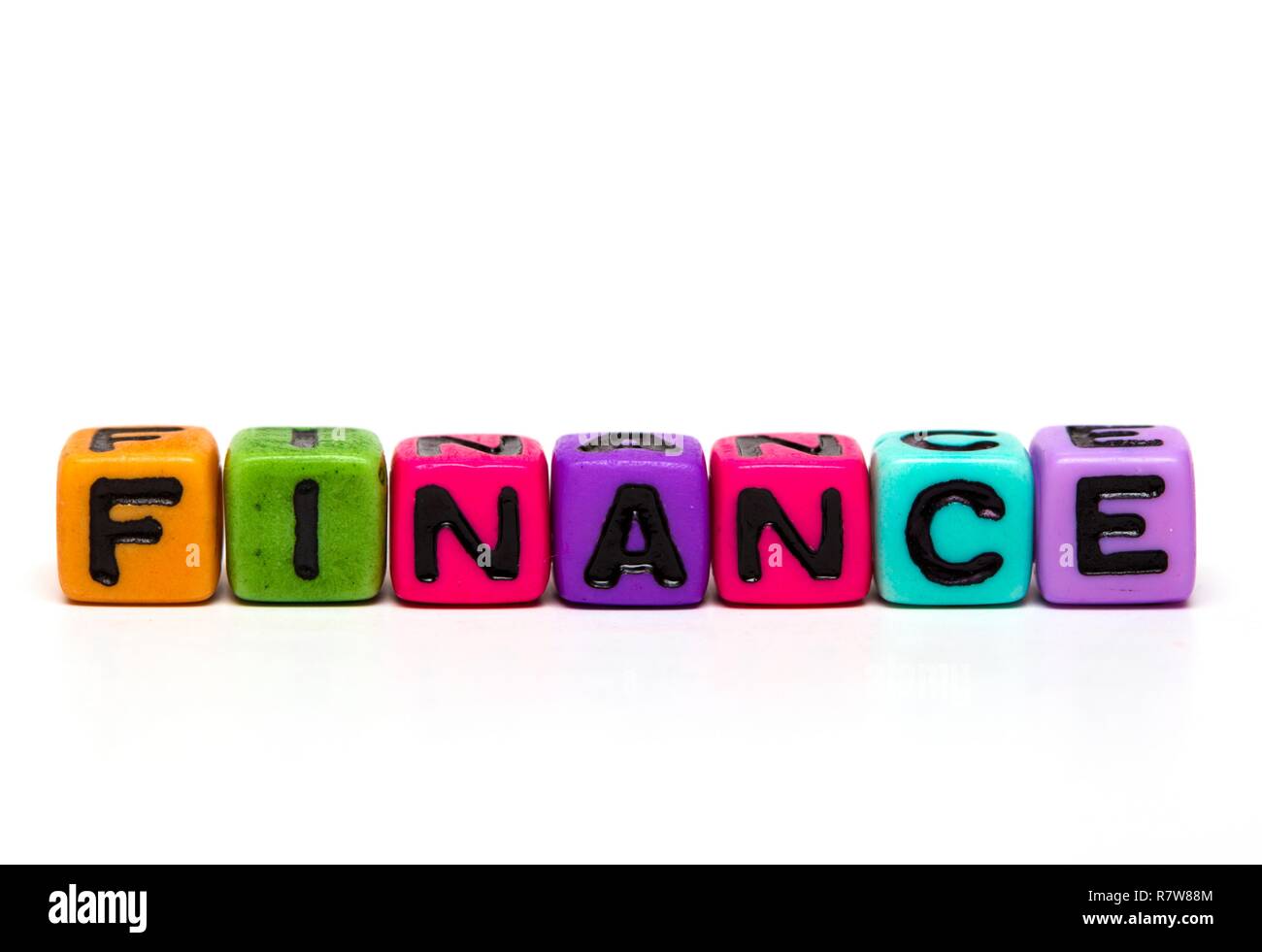 finance - word made from multicolored child toy cubes with letters ...